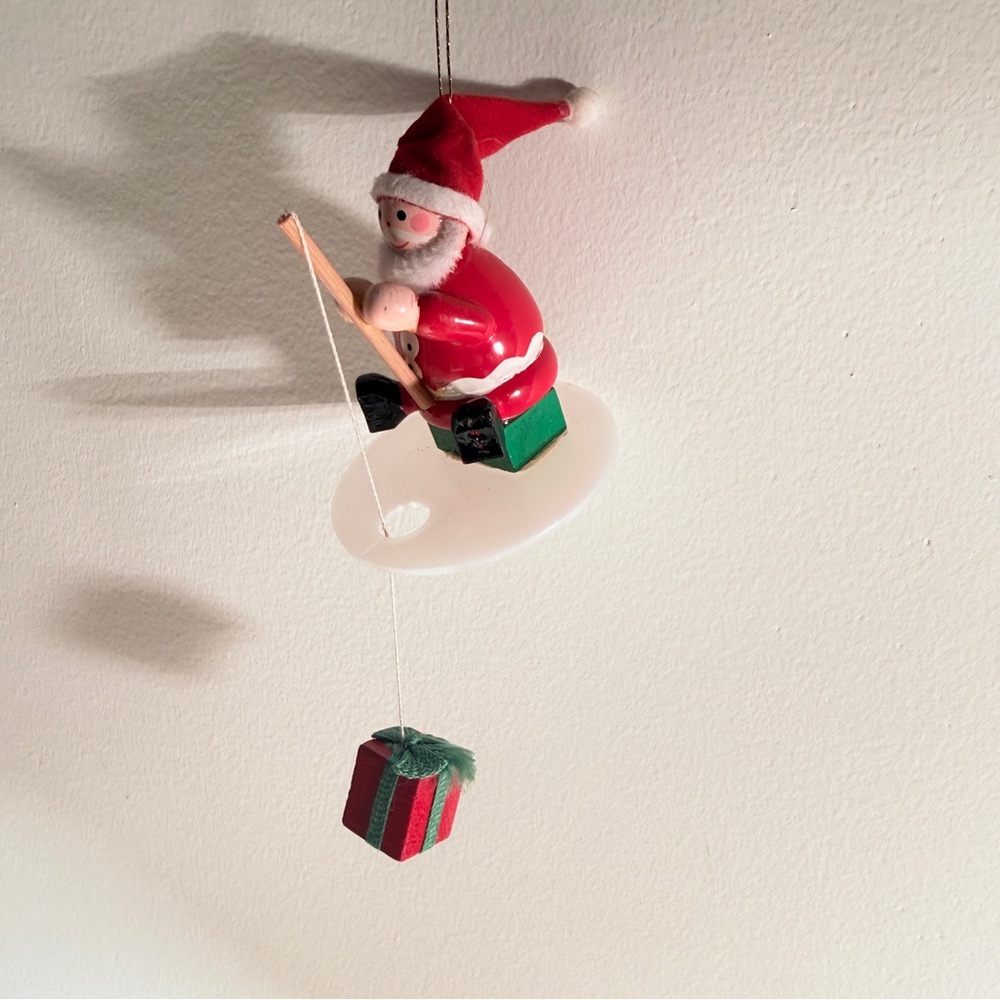 Santa Fishing Ornament with Gift